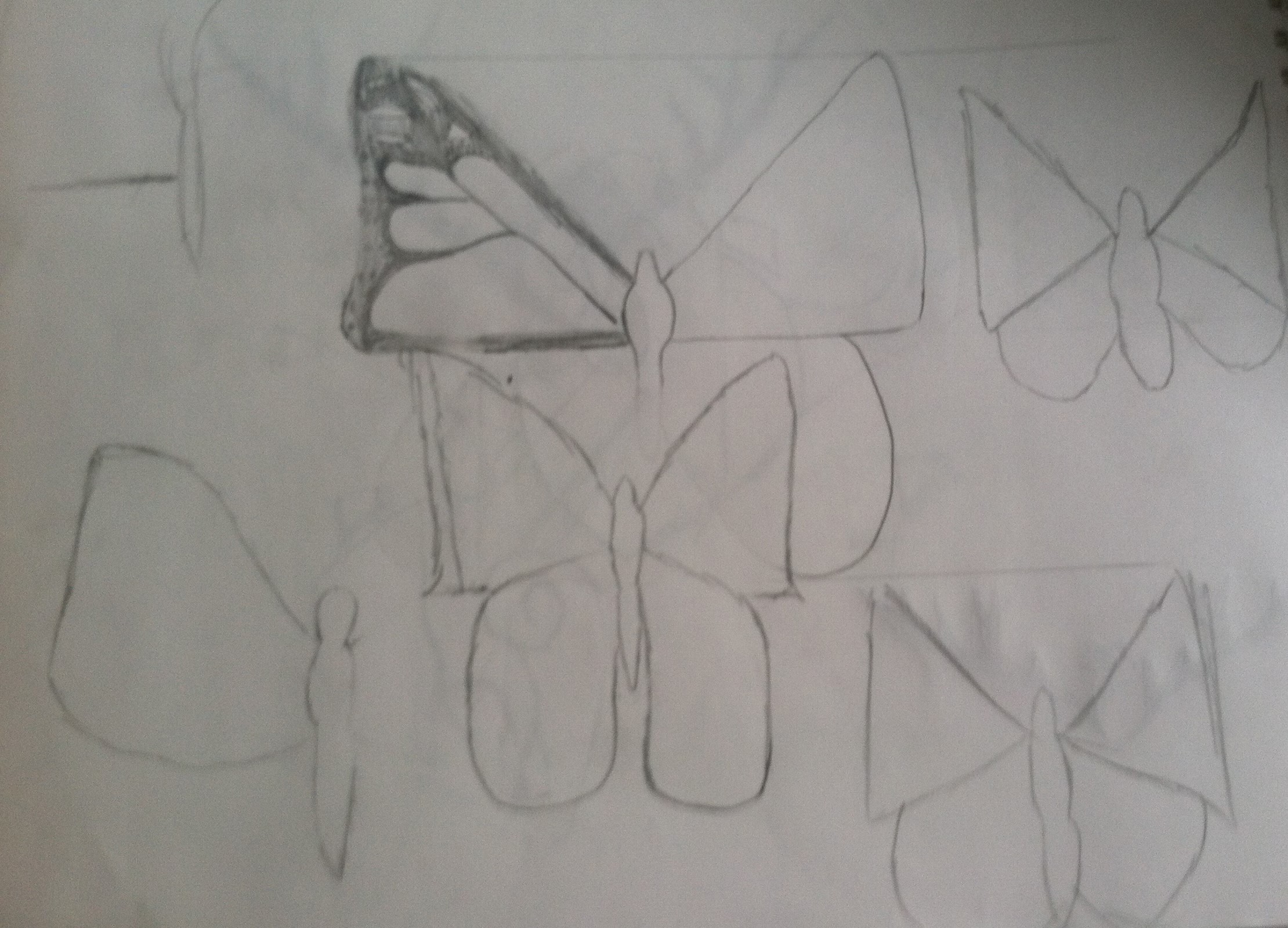First I had to get the shape of the butterfly down. I originally wanted to go with a monarch pattern, but soon scrapped that idea.