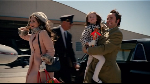 Peter and his family getting on a plane for Kansas.
