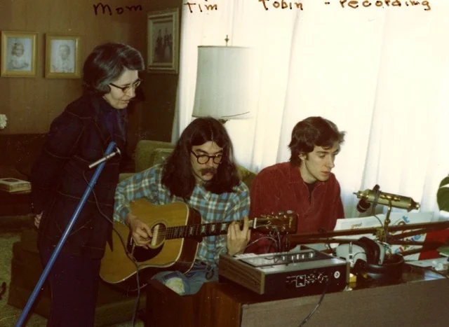 Tobin (far right) at age 15 recording with his mother and brother.