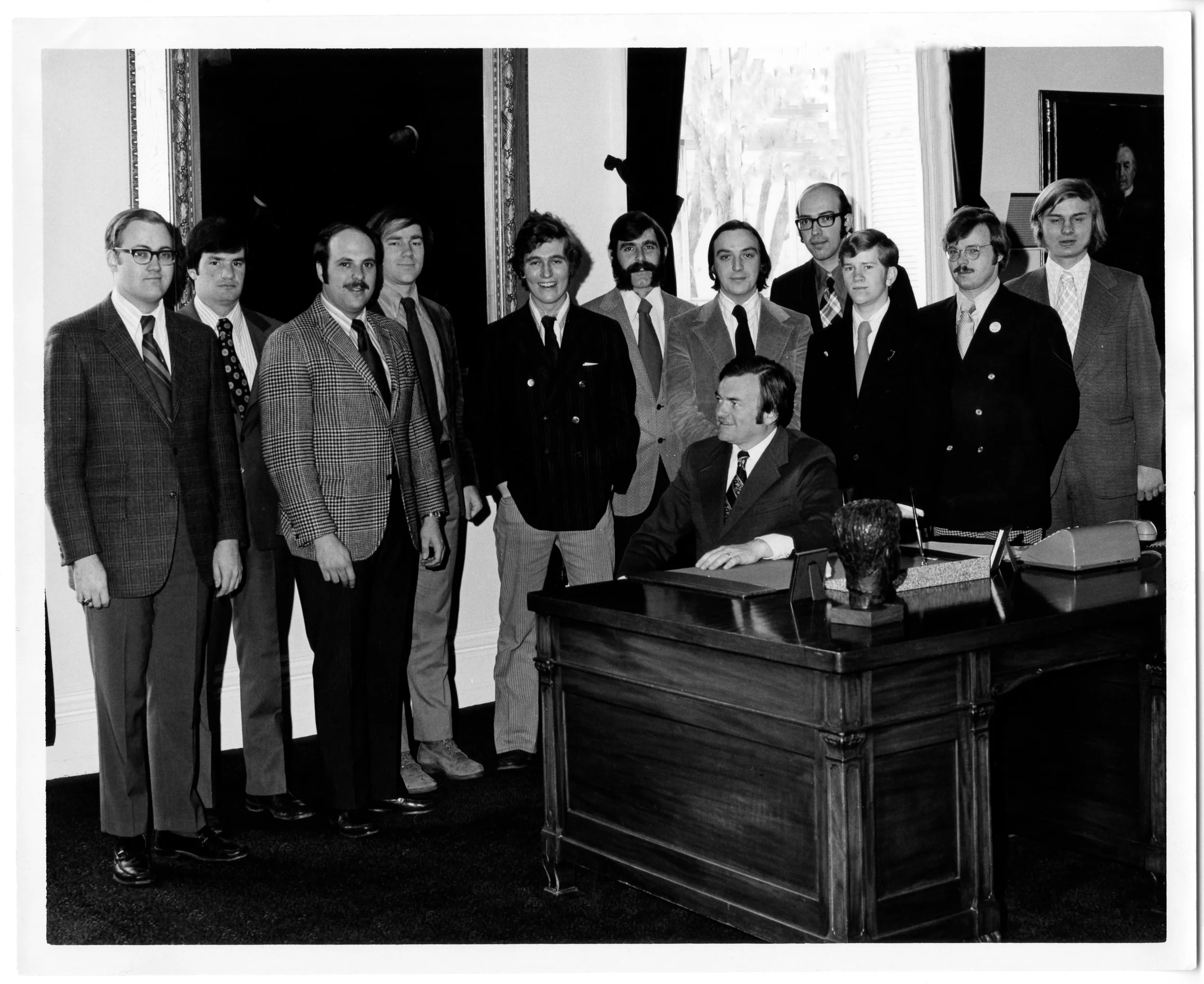 This is a picture of JD with Tom Salmon and other freshmen legislators under age 25 back in 1973. 