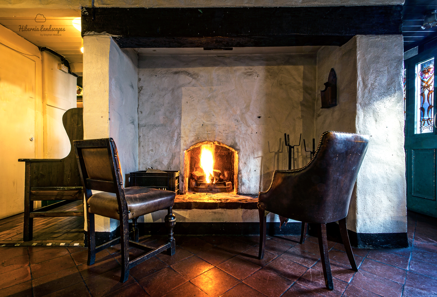 The snug bar, which was part of the original living quarters in the pub. This fireplace has remained unchanged since the 1750s.
