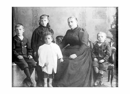 Mary-Jane Heenan seen here with her children. James on the far left took over from his mother after she died.