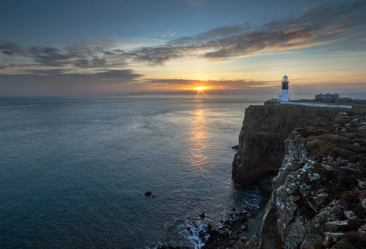 The East Lighthouse perched on Altacorry Head.