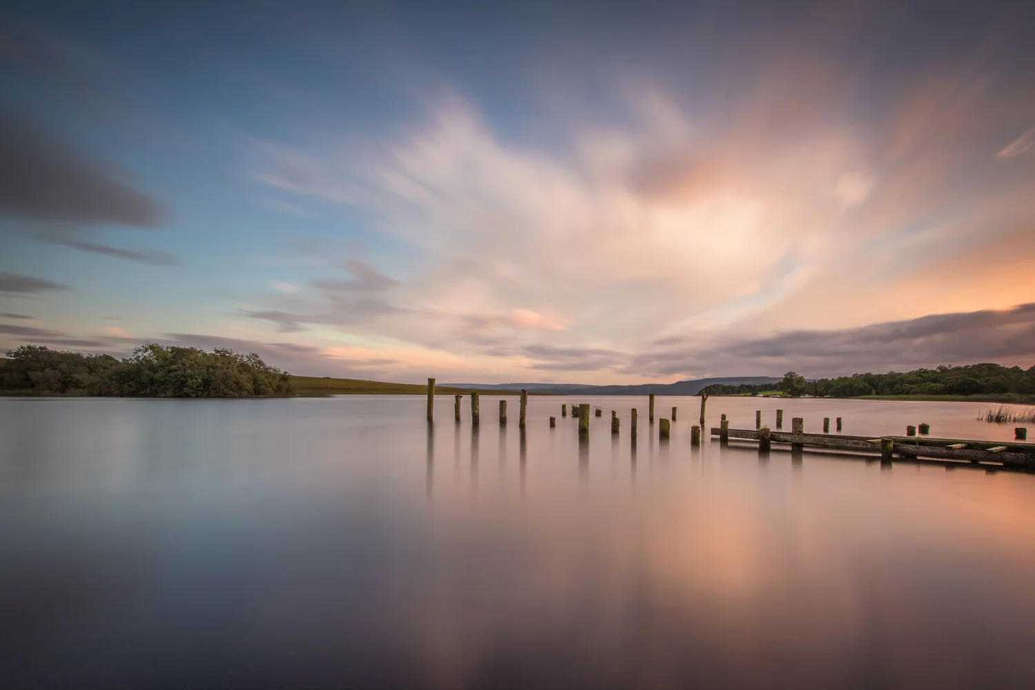 Summer skies over the old jetty to Hare Island