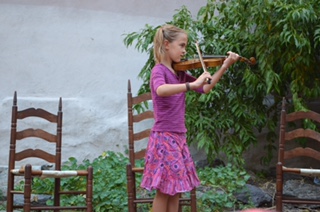 An Instrumental Story Tellers performance at the Electric Ladybug Community Garden.