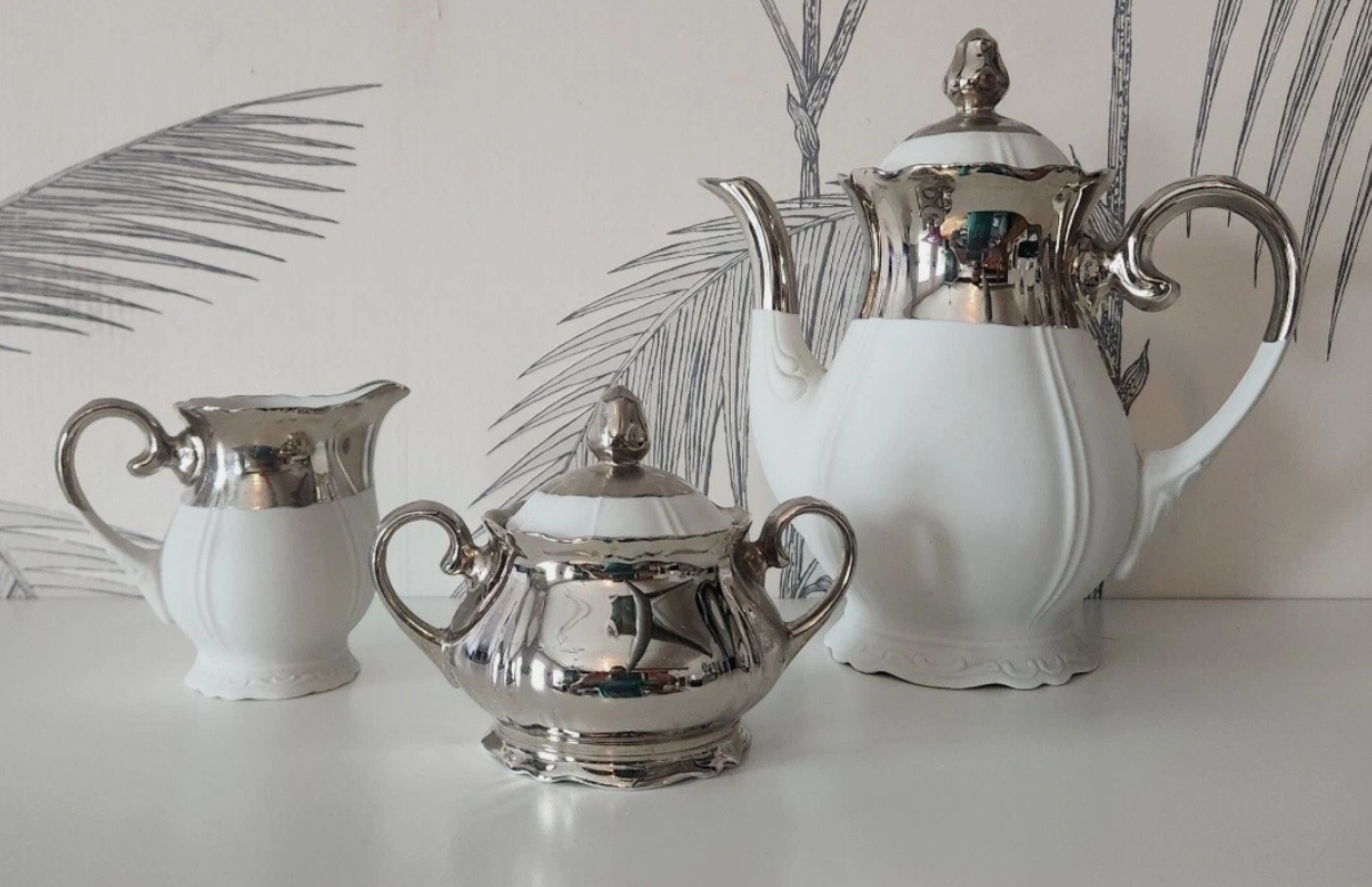 Coffee Pot, Creamer, and Sugar Bowl set by Reichenbach 1.png