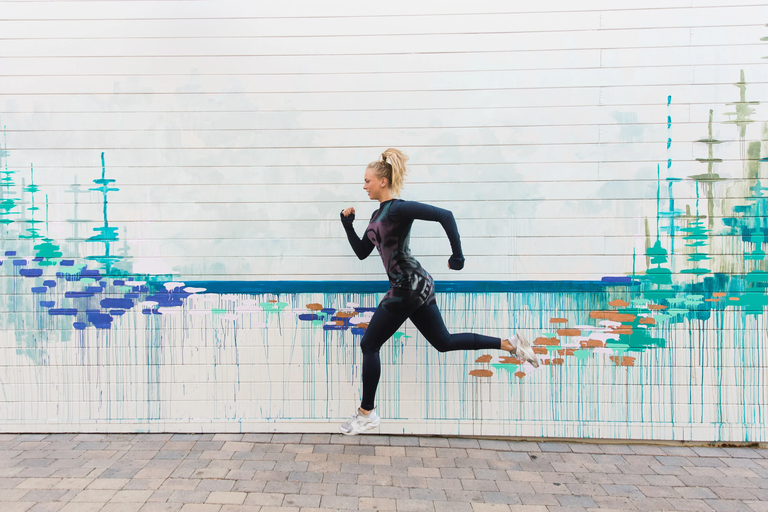 Long sleeve cashmere crewneck shirt ($130), high-rise liquid leggings in navy ($96), racerback rib dress ($268)