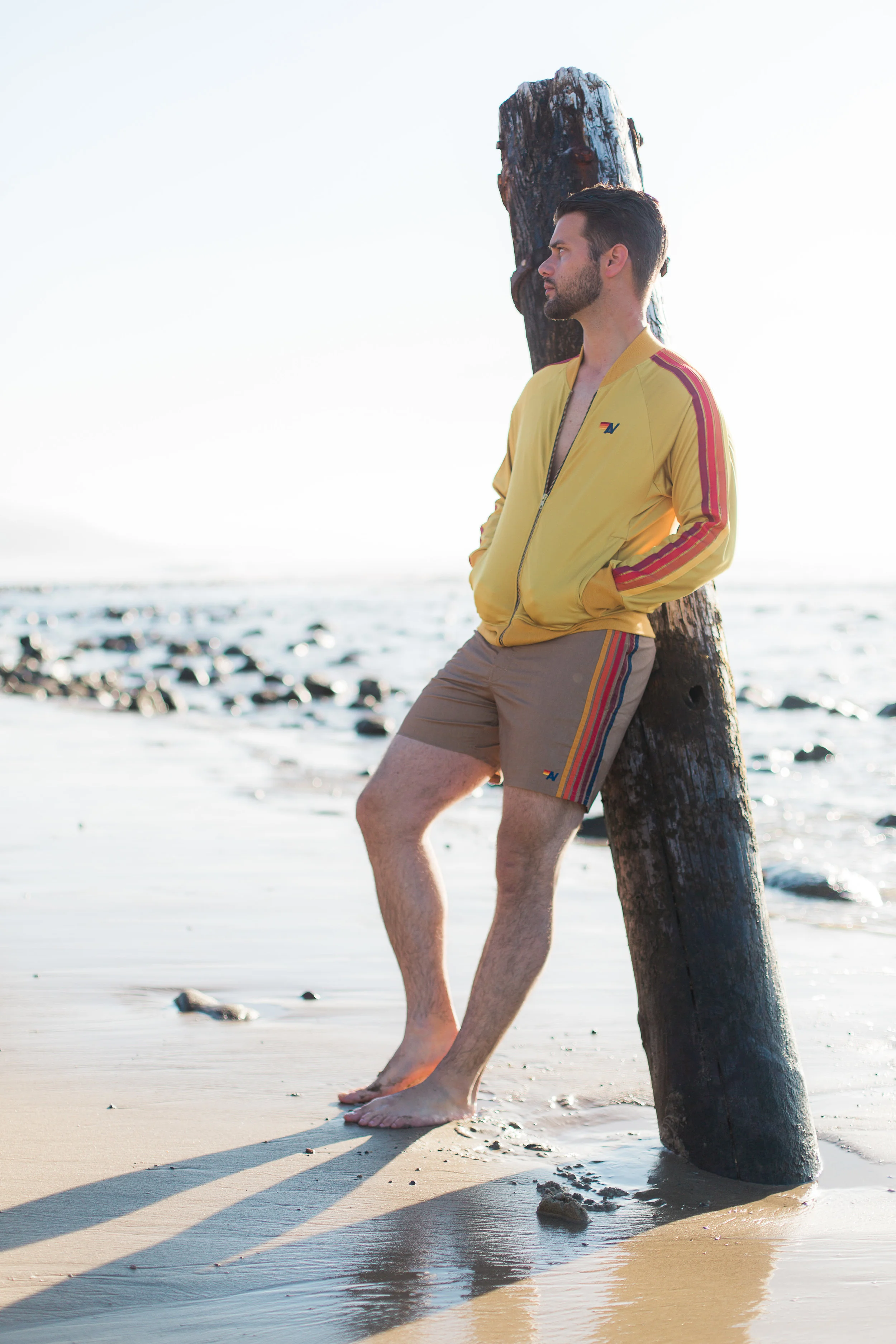 5 Stripe Hoodie, $189; 5 Stripe Board Shorts in Vintage Gold, $168