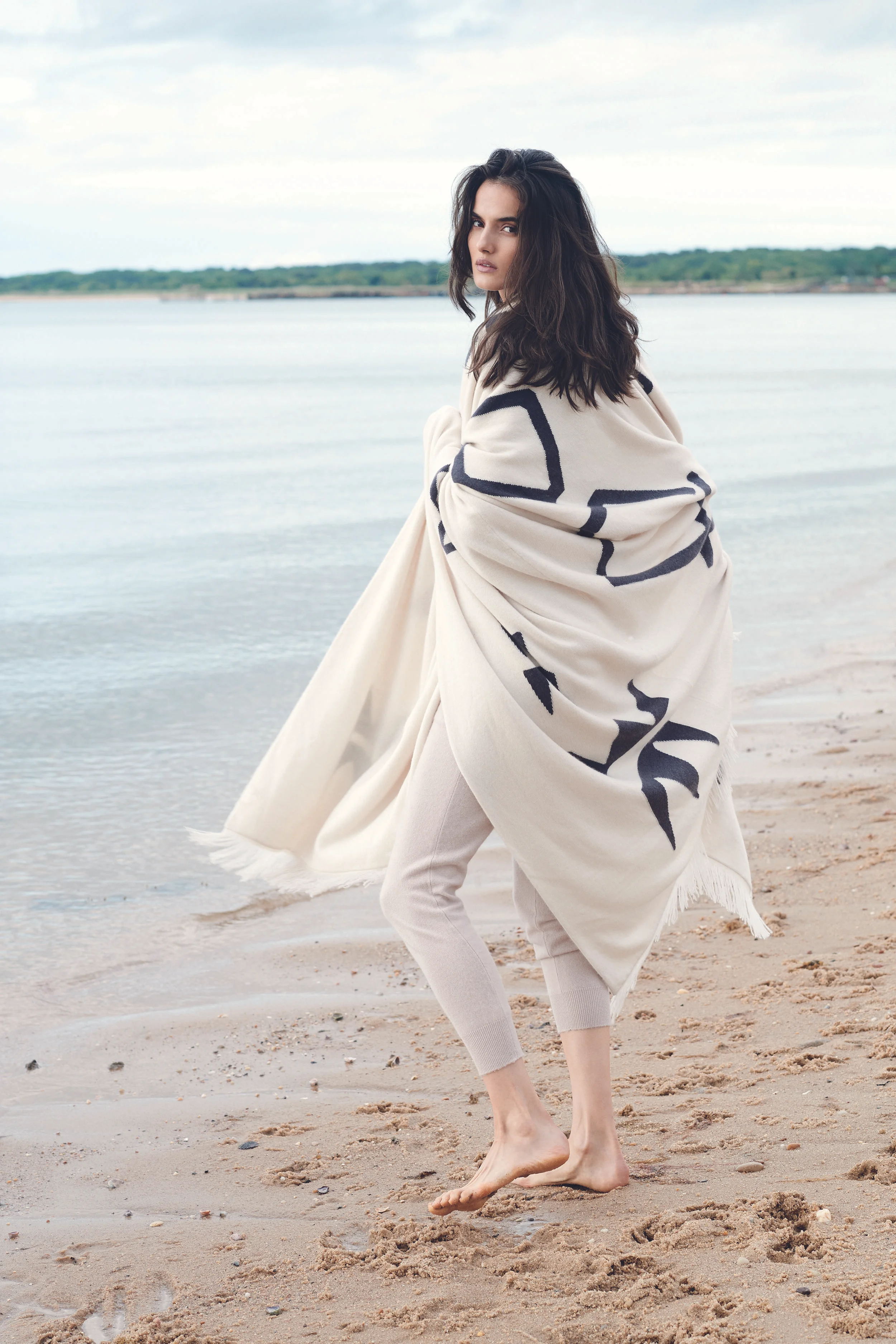 Mabel Blanket, 100% Cashmere, $600; Patti Jumpsuit, 100% Cashmere, $195