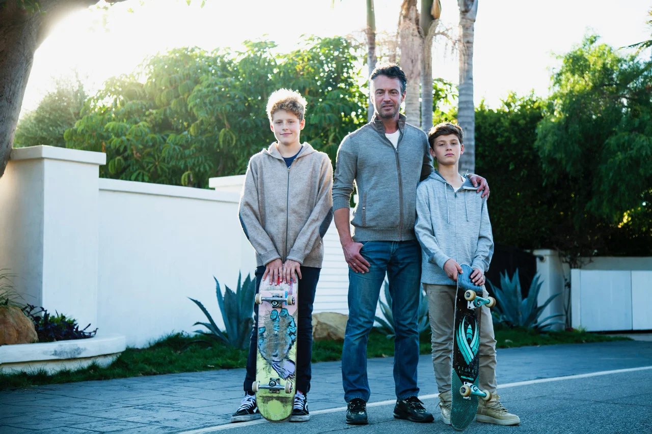 Daniel Adams and his two sons Emilio and Tassilo on Broad Beach Road. Photo by Isak Tiner