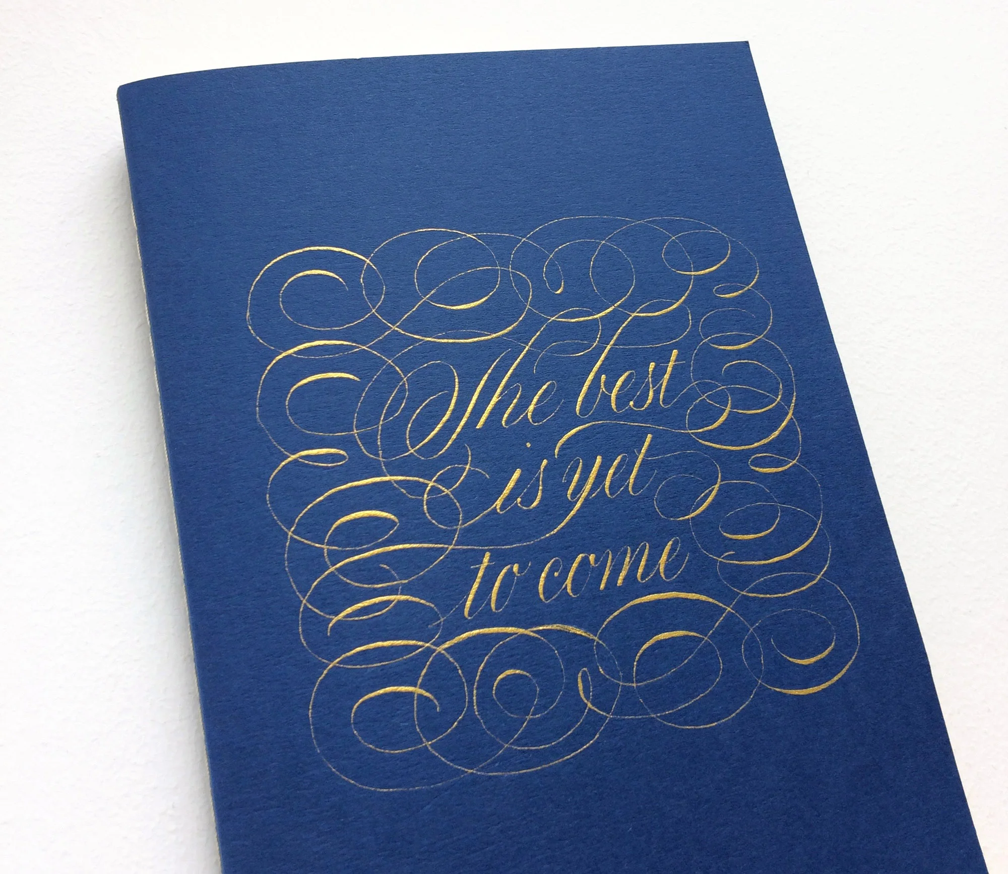 Personalized notebook with a quote The best is yet to come | Calligraphy by Type and Graphics Lab