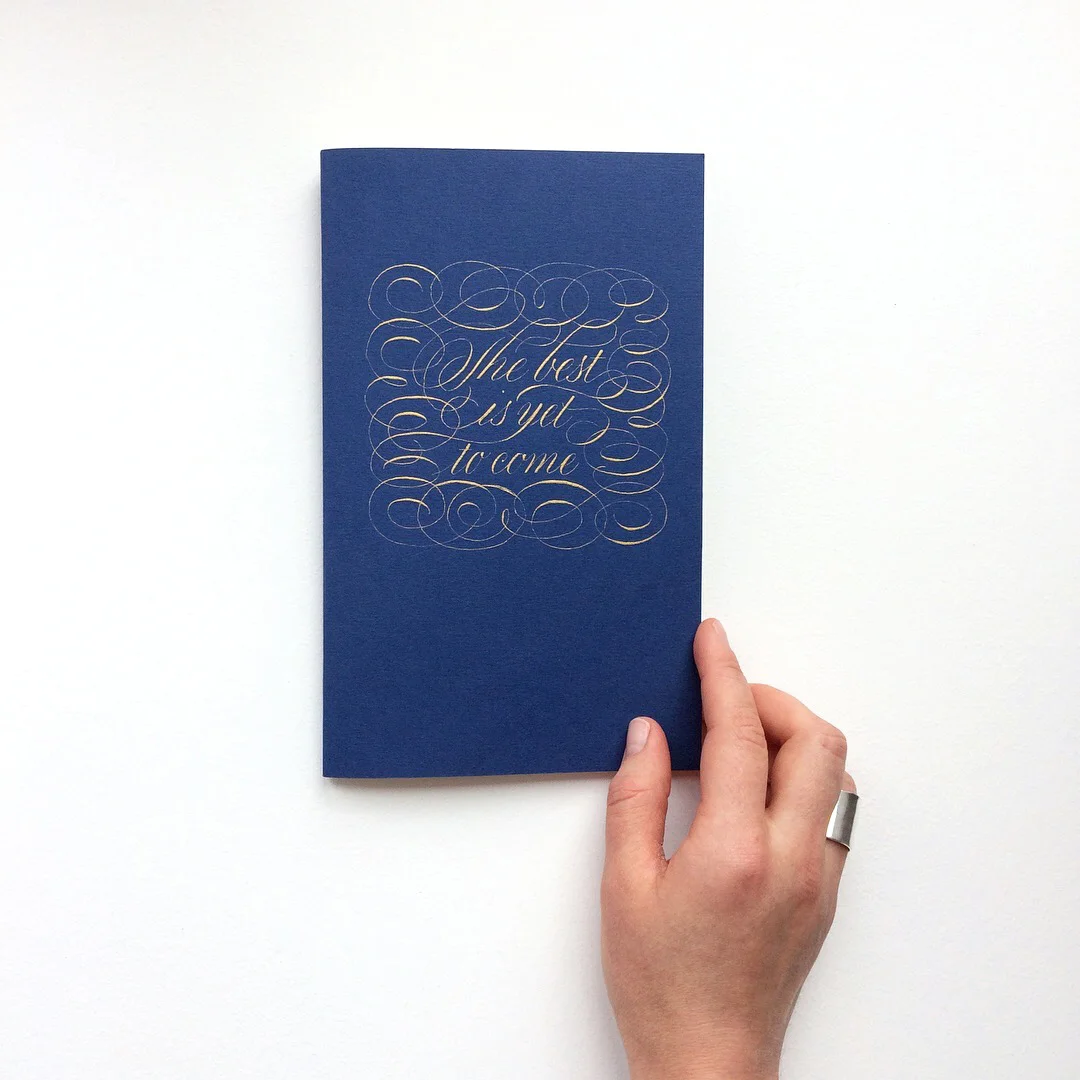 Personalized notebook with a quote The best is yet to come | Calligraphy by Type and Graphics Lab