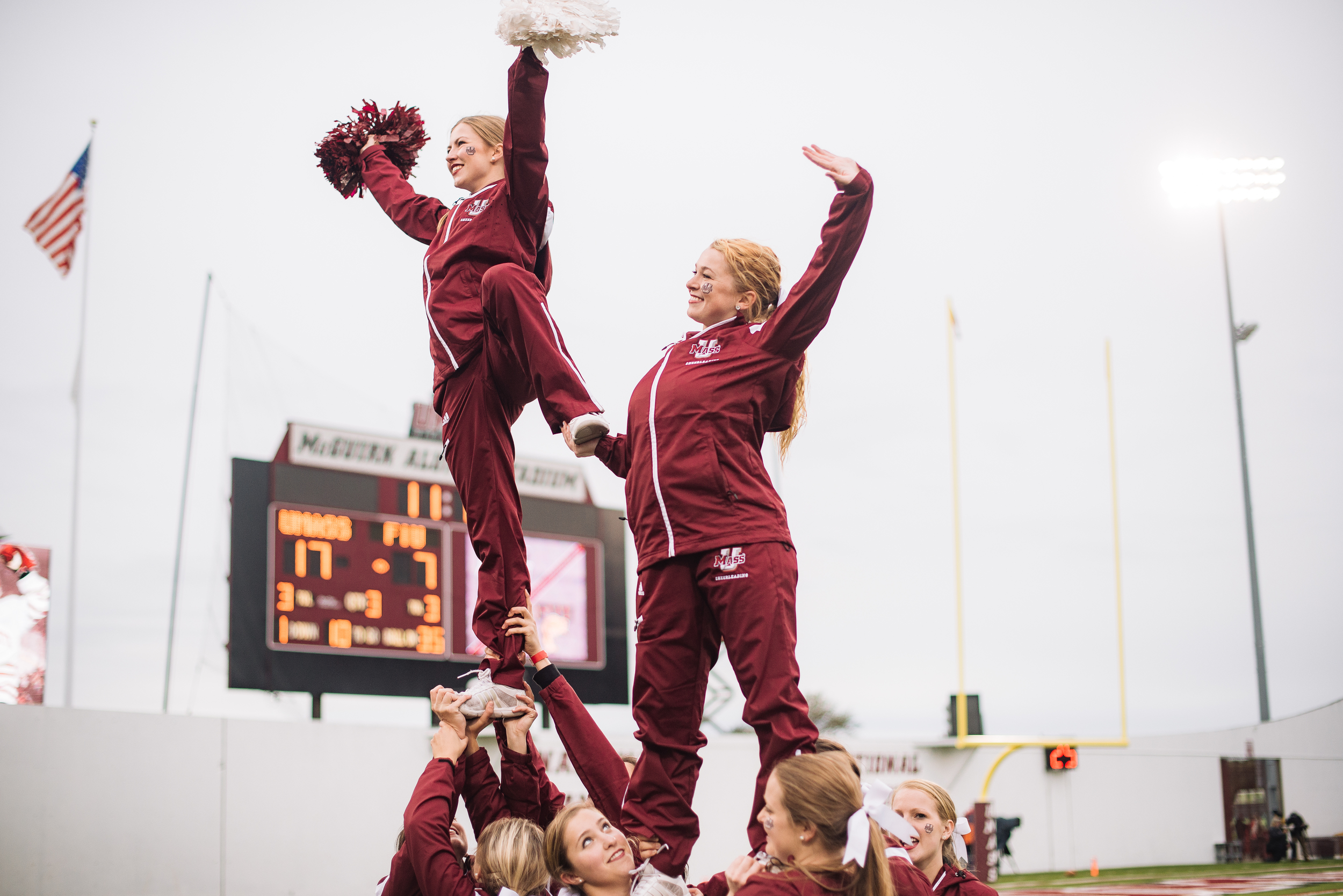  UMass Cheerleaders at a football game. Photo by Judith Gibson-Okunieff 