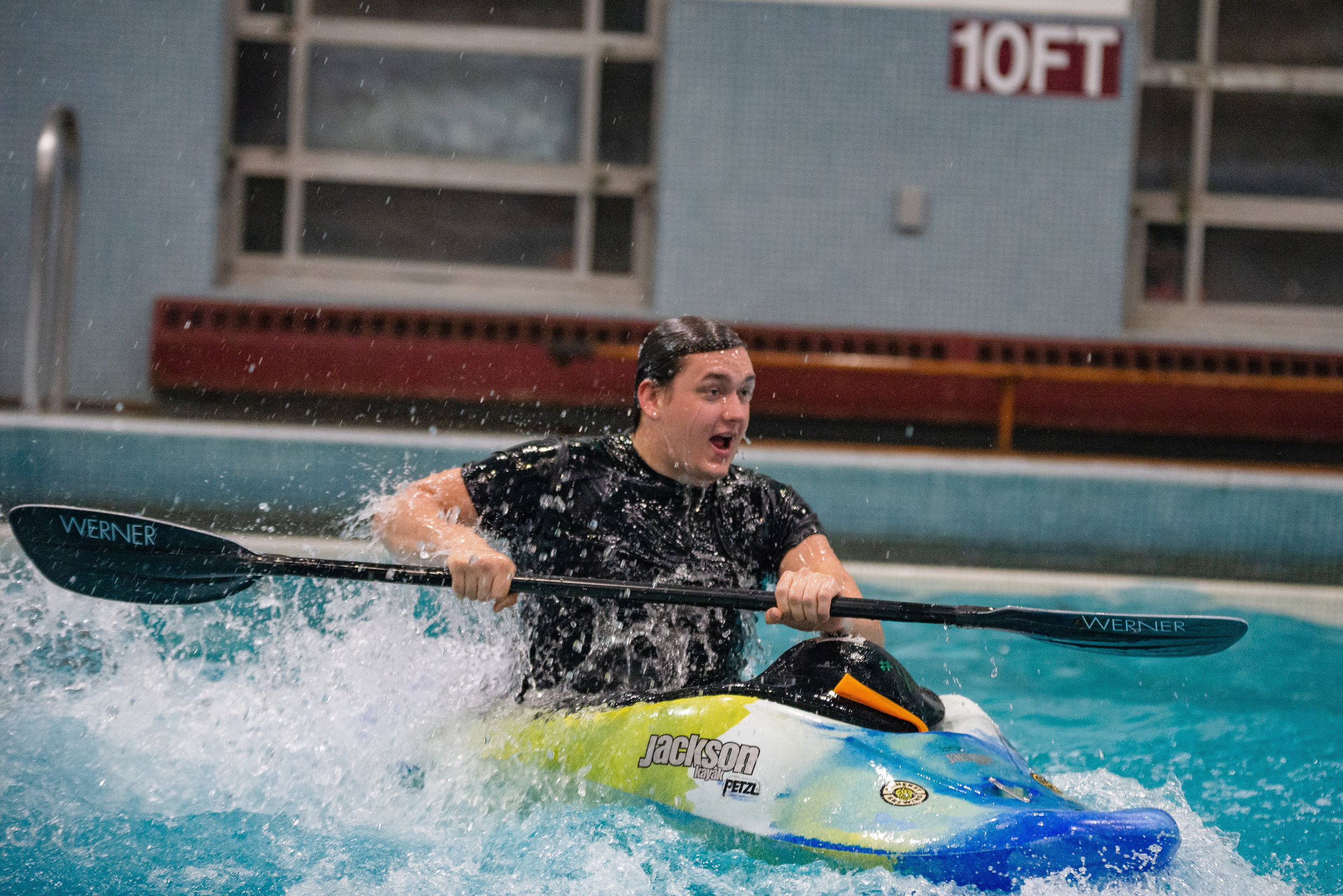  Max Swenson, junior business management and psychology, kayaks in Totman pool during UMOC's kayaking session. 