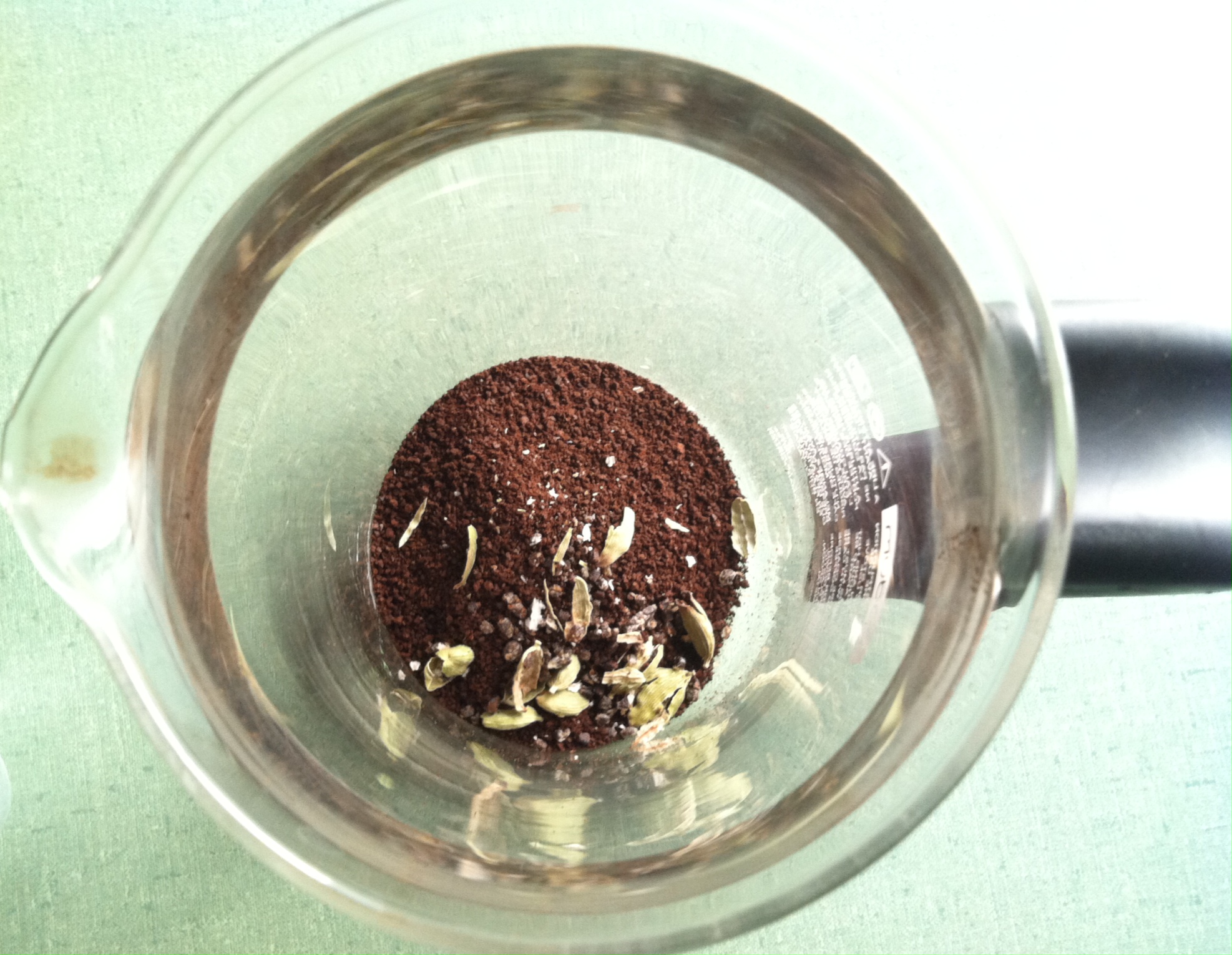 Cardamom and coffee grounds