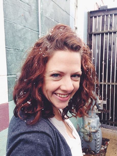 Sarah's curls on display during the first winter snow!