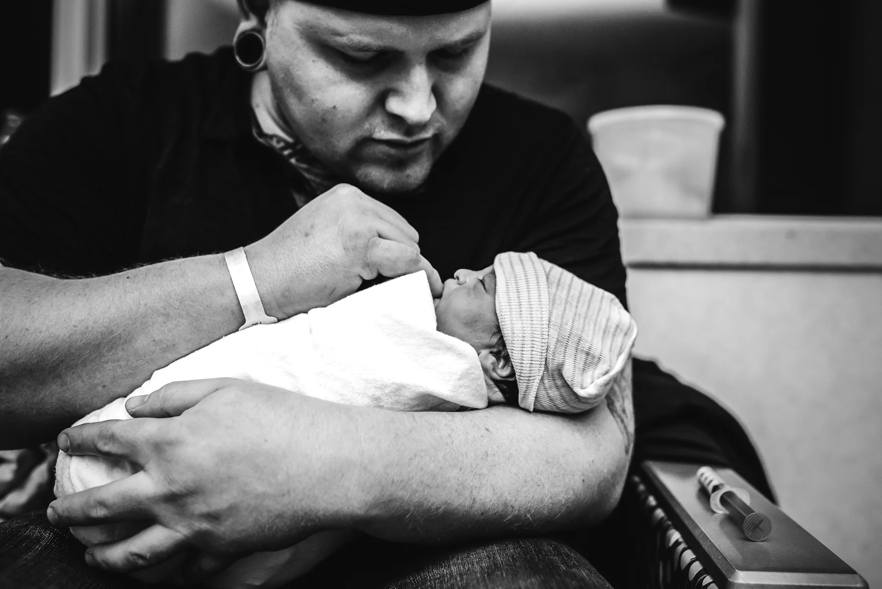 denver-birth-photographer-dad-holds-baby