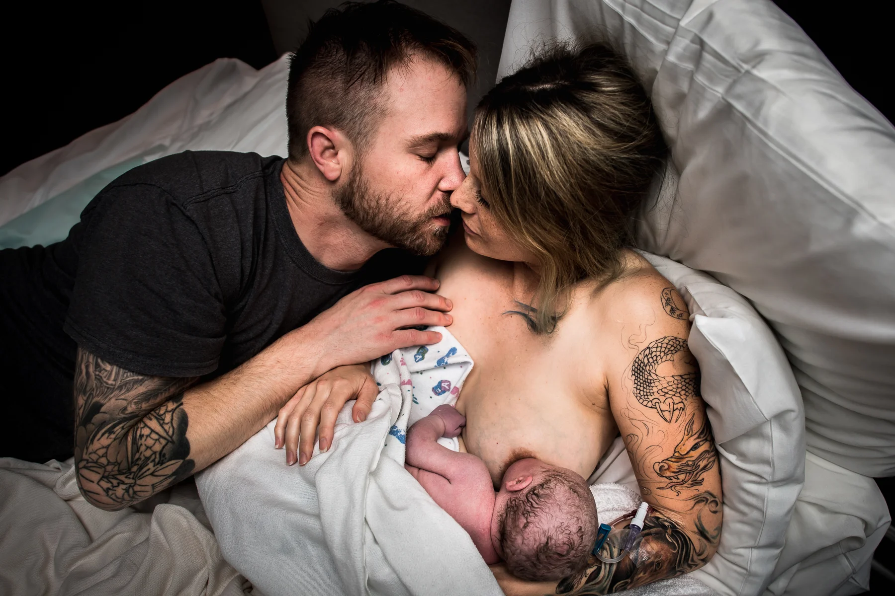 couple-embraces-after-birth
