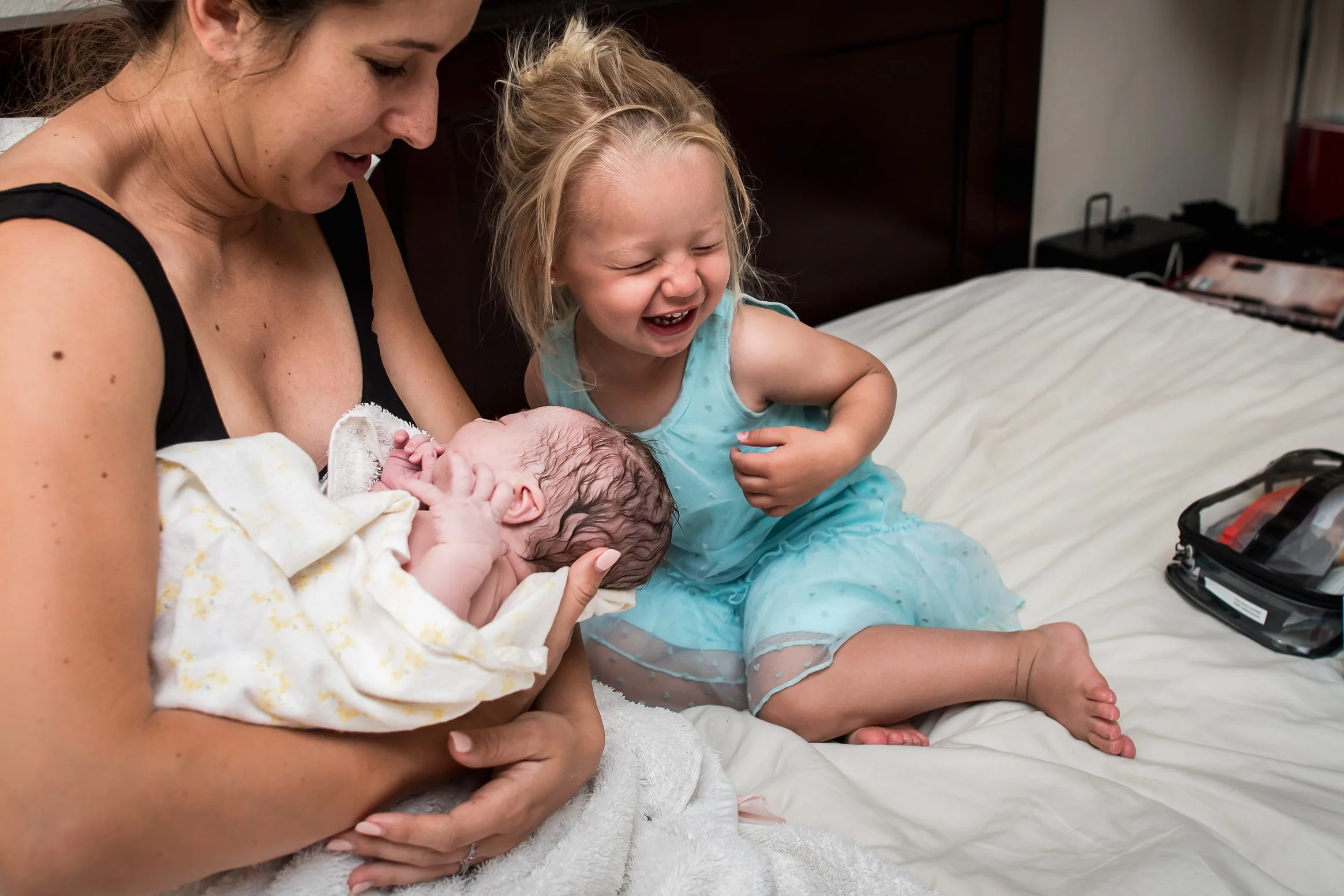 Big sister meets baby brother at Colorado Springs Homebirth