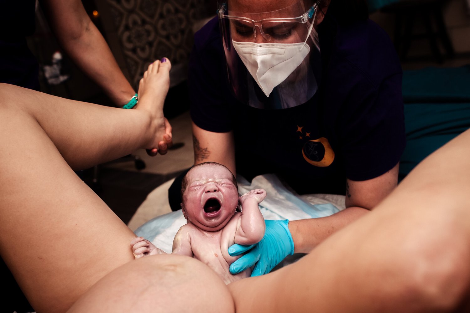 A peaceful 4th birth at Seasons Birth Center in Denver, Co