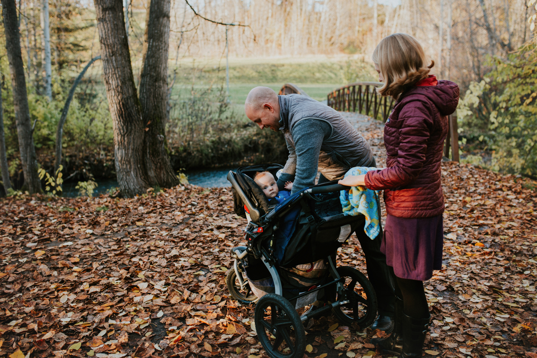 baby in stroller on chester creek trail