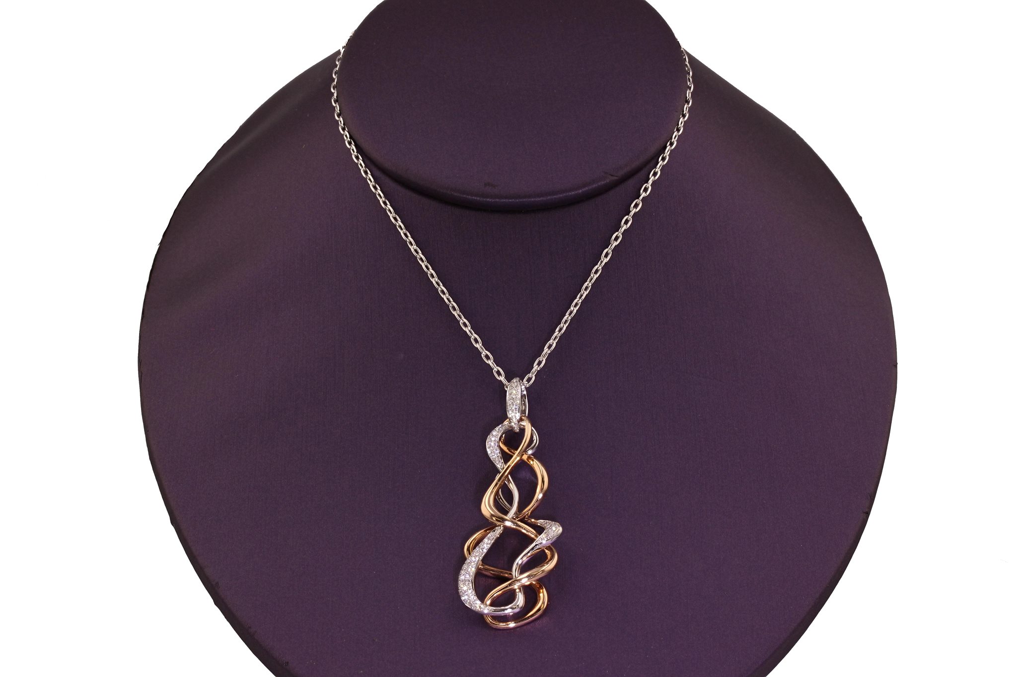 18kt White and Rose Gold two-piece Diamond Pavé "Double Twist" Pendant and Chain. 0.30 ctw. $3900