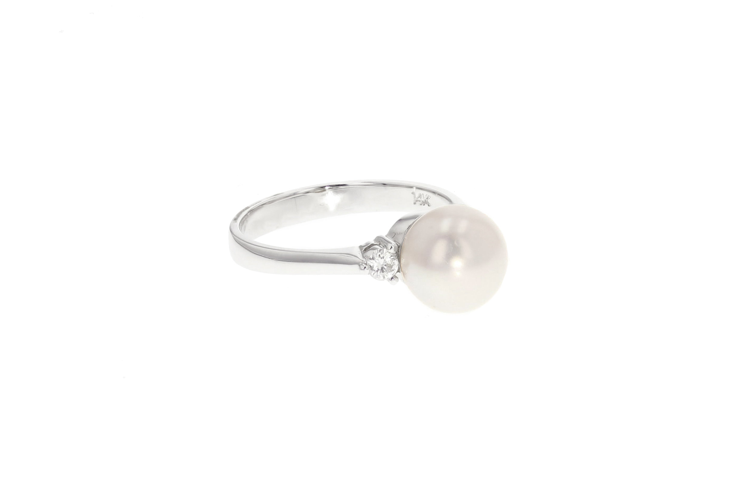 14k w/g Diamond and Pearl ring. $1420