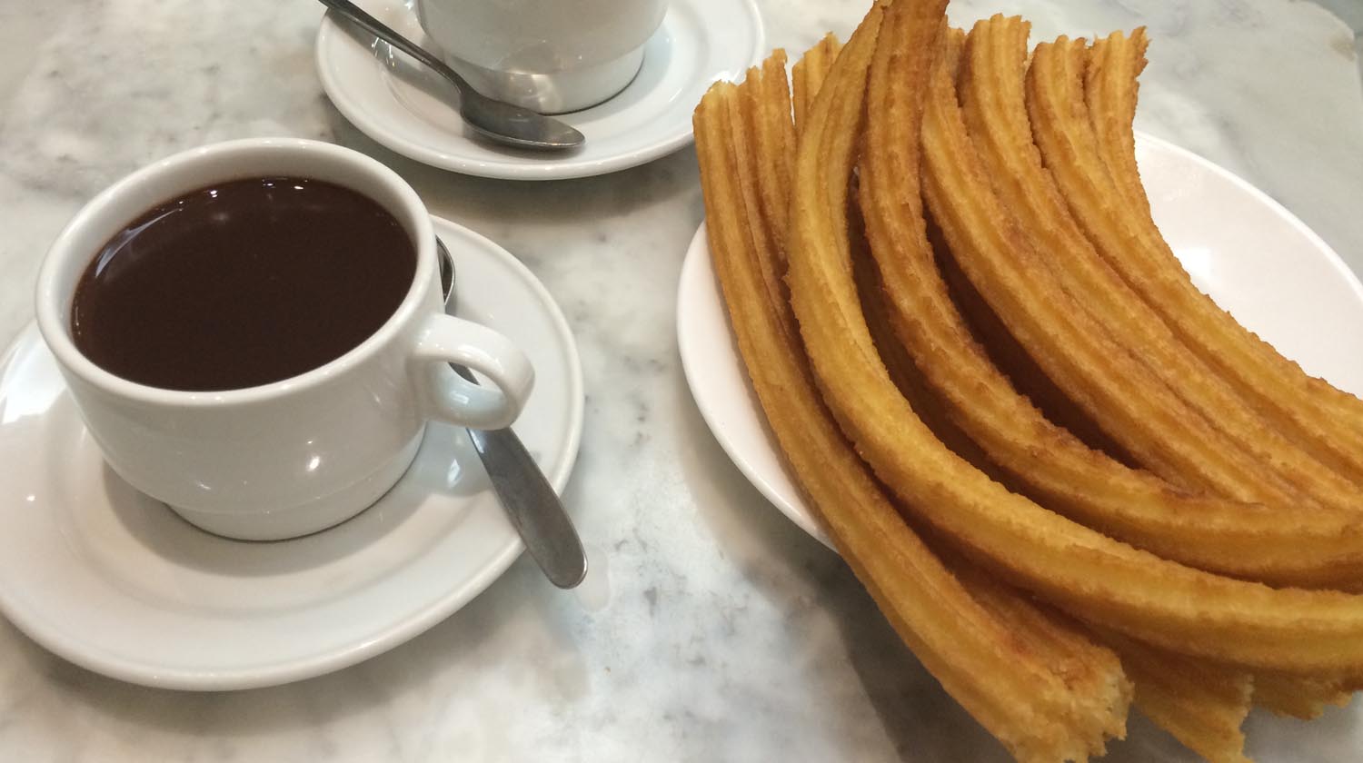 Enjoy the hot chocolate at San Gines Chocolateria during our Goya's Madrid Tour