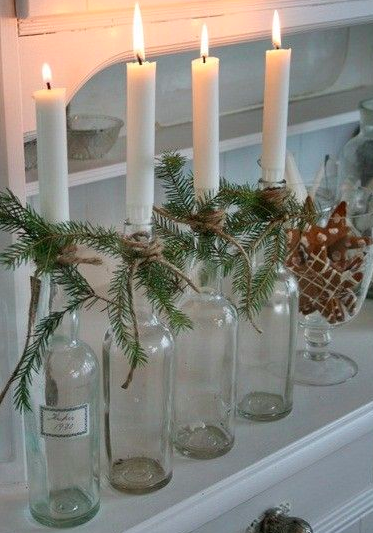 What a great way to recycle! Put some candlesticks into empty wine bottles with sprigs of spruce tied with twine, an array of them look gorgeous. 