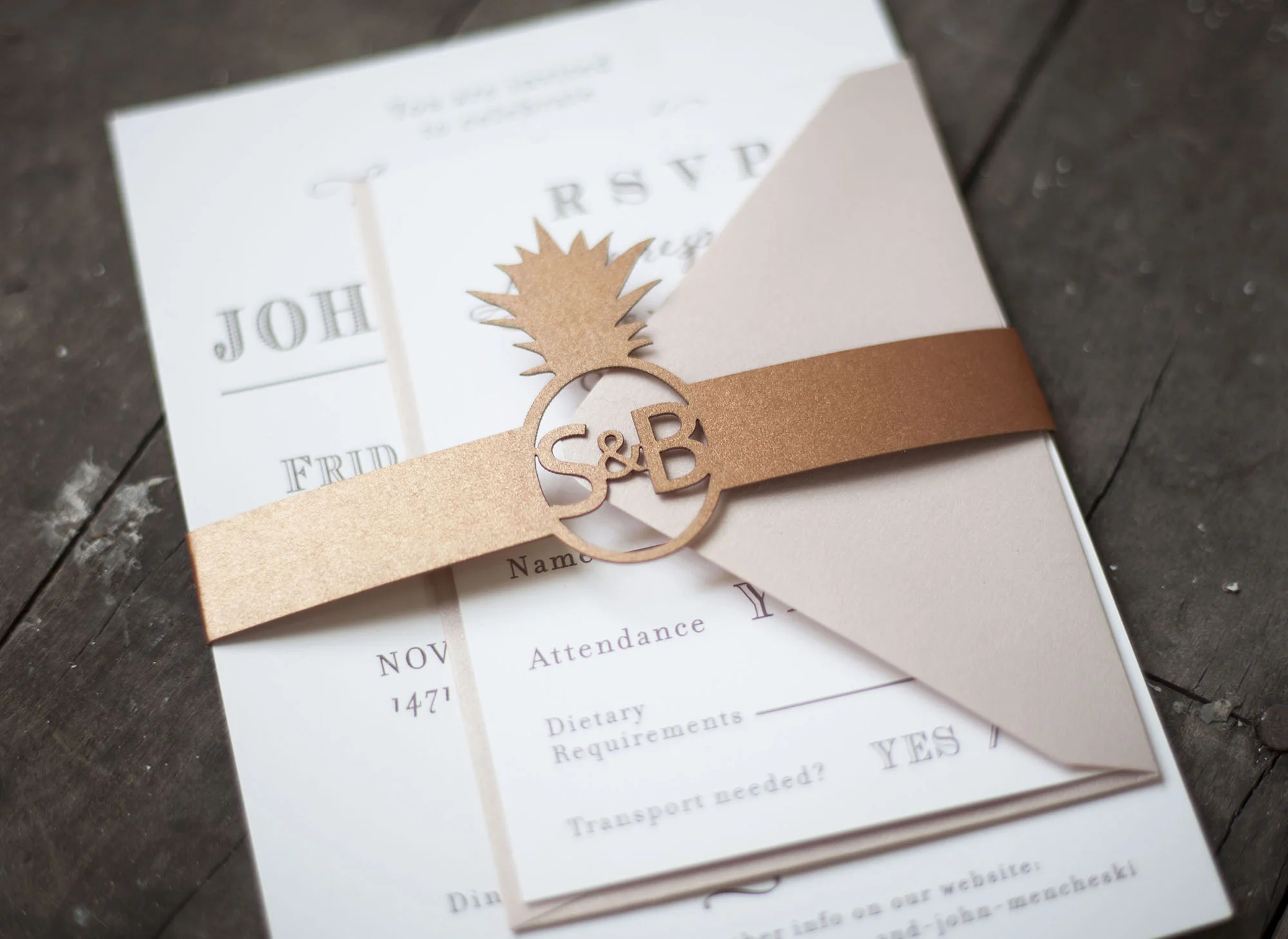 A custom copper laser cut belly band with a pineapple and monogram