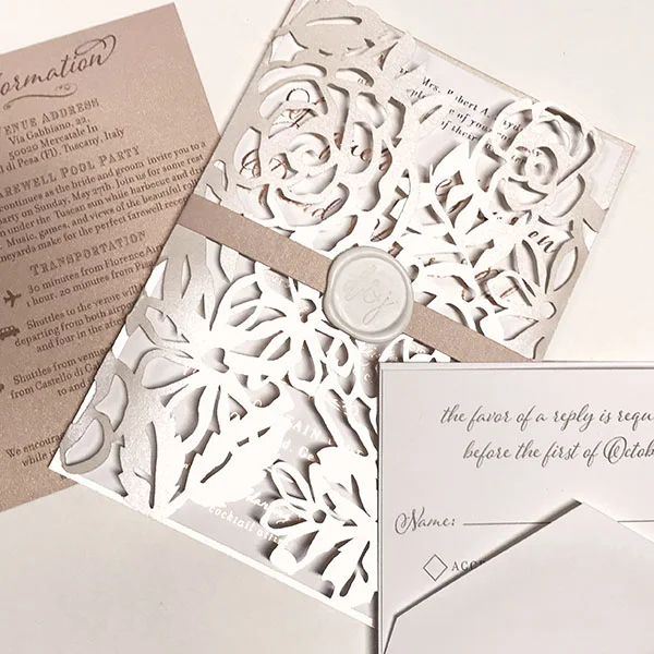 white_flower_wedding_invitation.jpg