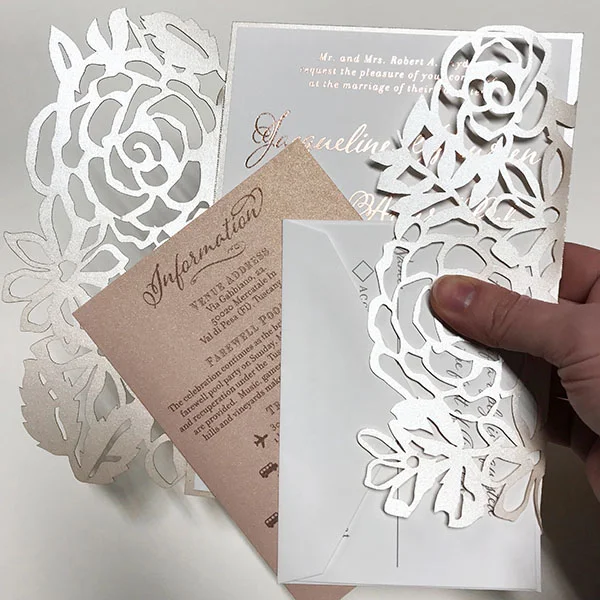 pearl_white_lasercut_floral_invite.jpg