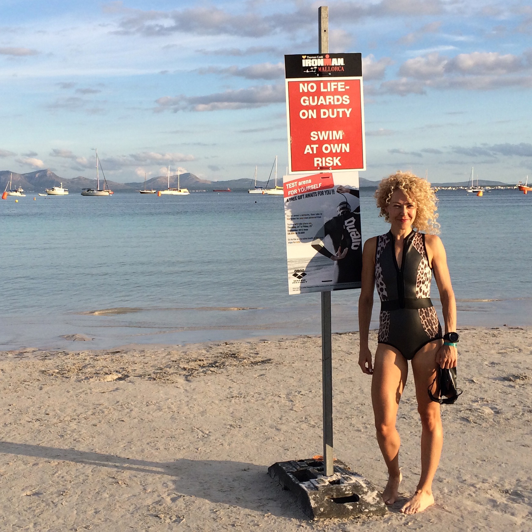 Couldn't wait to churn up that water. Raced stingrays, jellyfish, & what looked like a tiger shark over a coral reef on the swim course...I think the @duskiiactive wetsuit scared them. #IronGlam