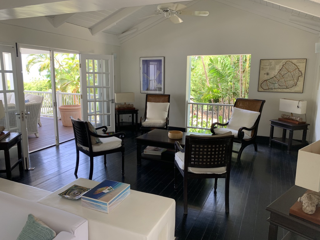 The formal sitting room with doors to the verandah.