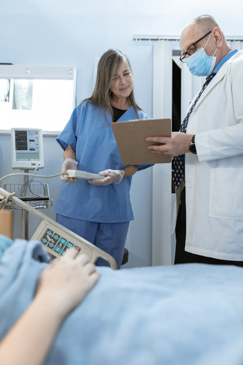 A confident doctor and nurse.