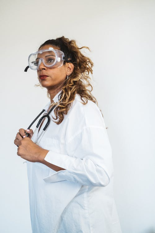 A woman in an antibacterial gown.