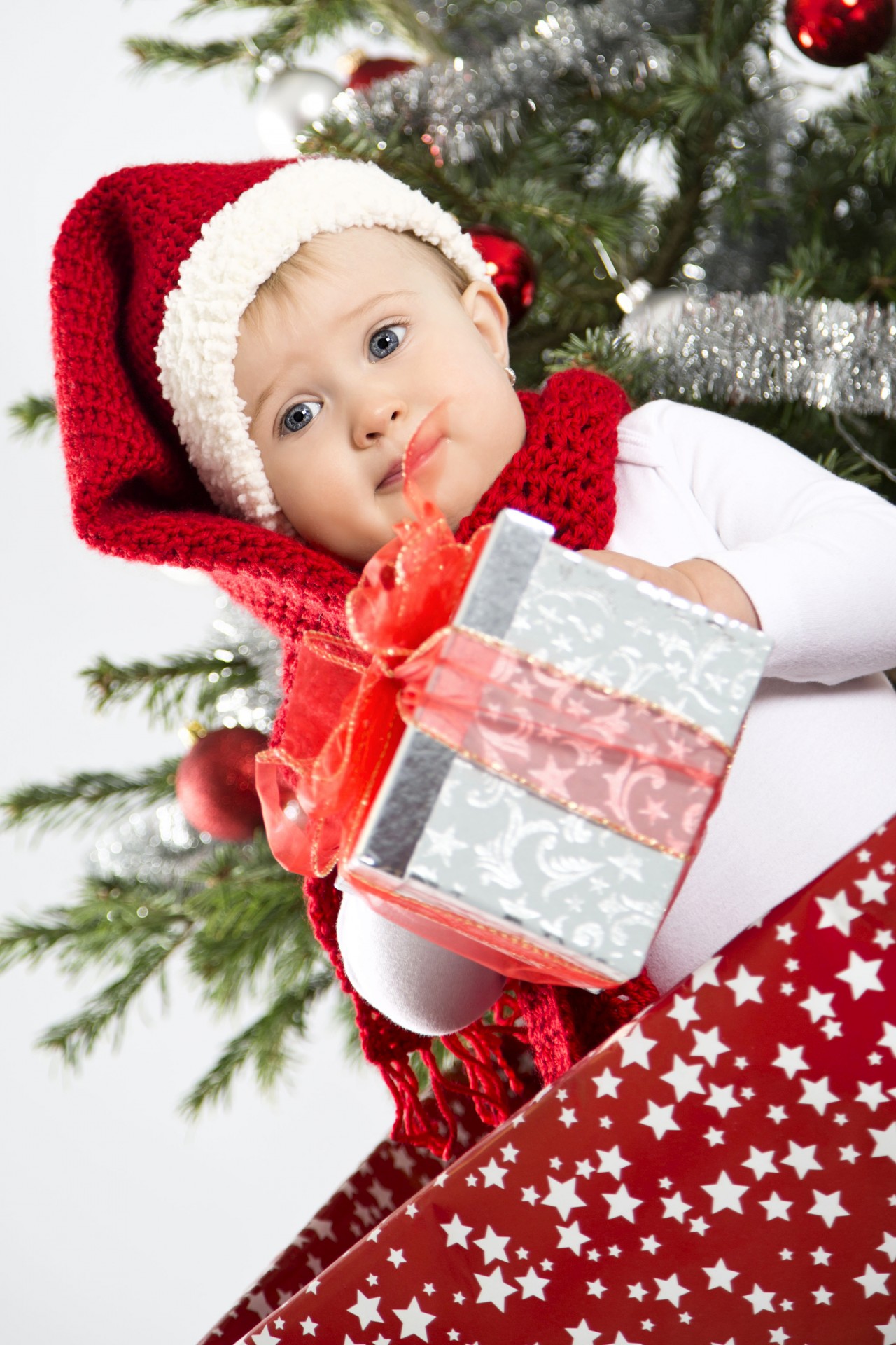Baby with a Christmas present