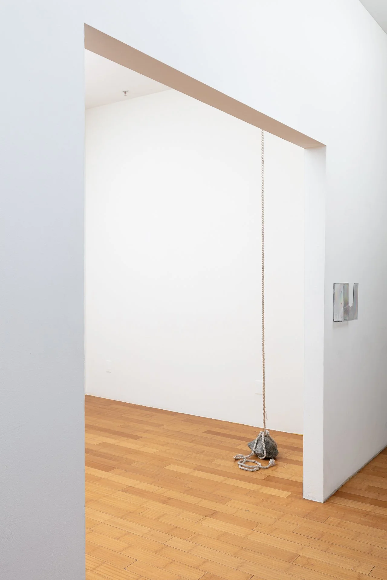 Enduring Gravity (installation detail) paper mâché, rope, wood, hardware, graphite on paper Dimensions variable 2025