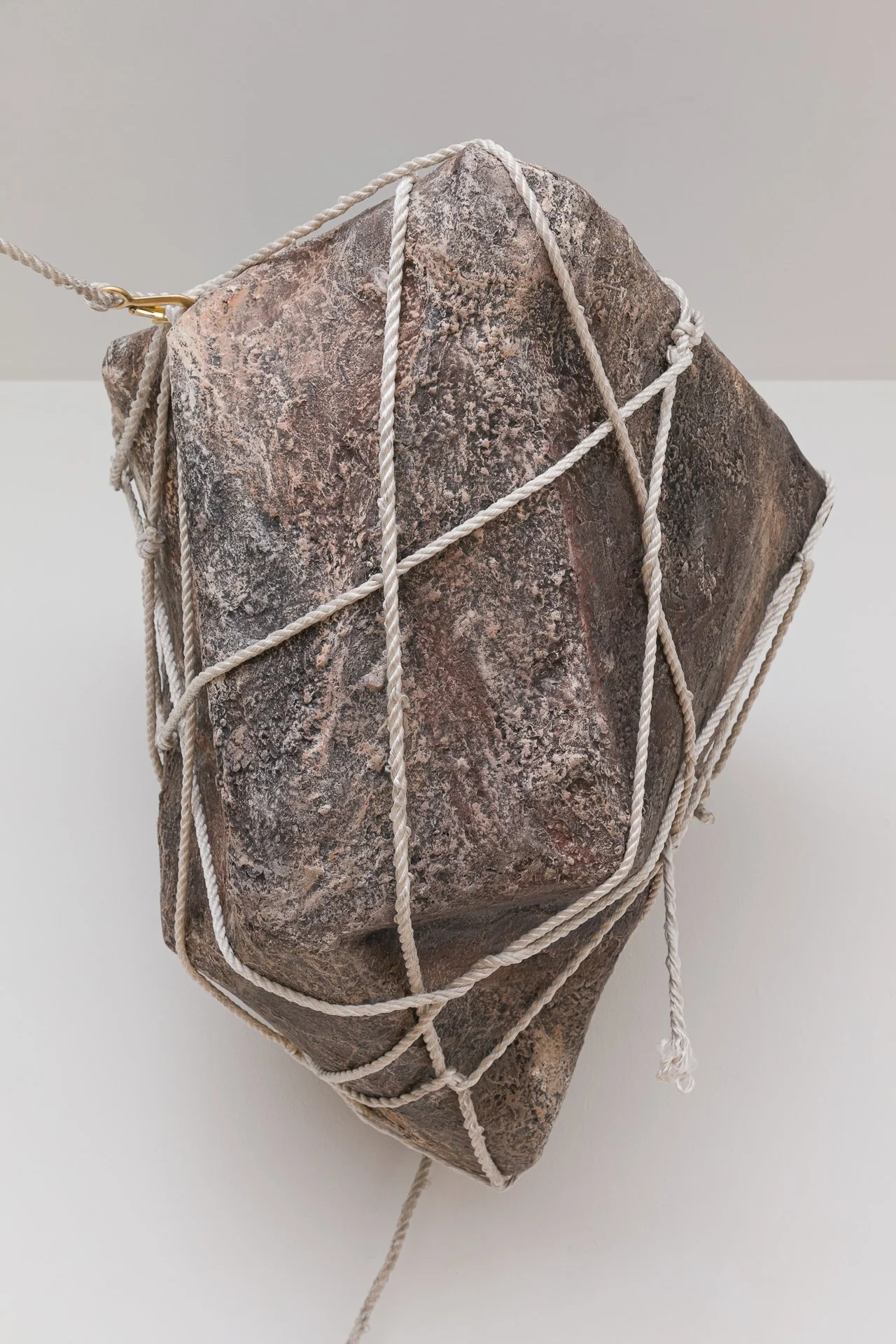Enduring Gravity (installation detail) paper mâché, rope, wood, hardware, graphite on paper Dimensions variable 2025