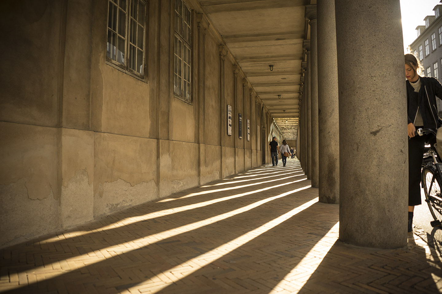 Sunlight Through Columns with Girl Pondering.jpg