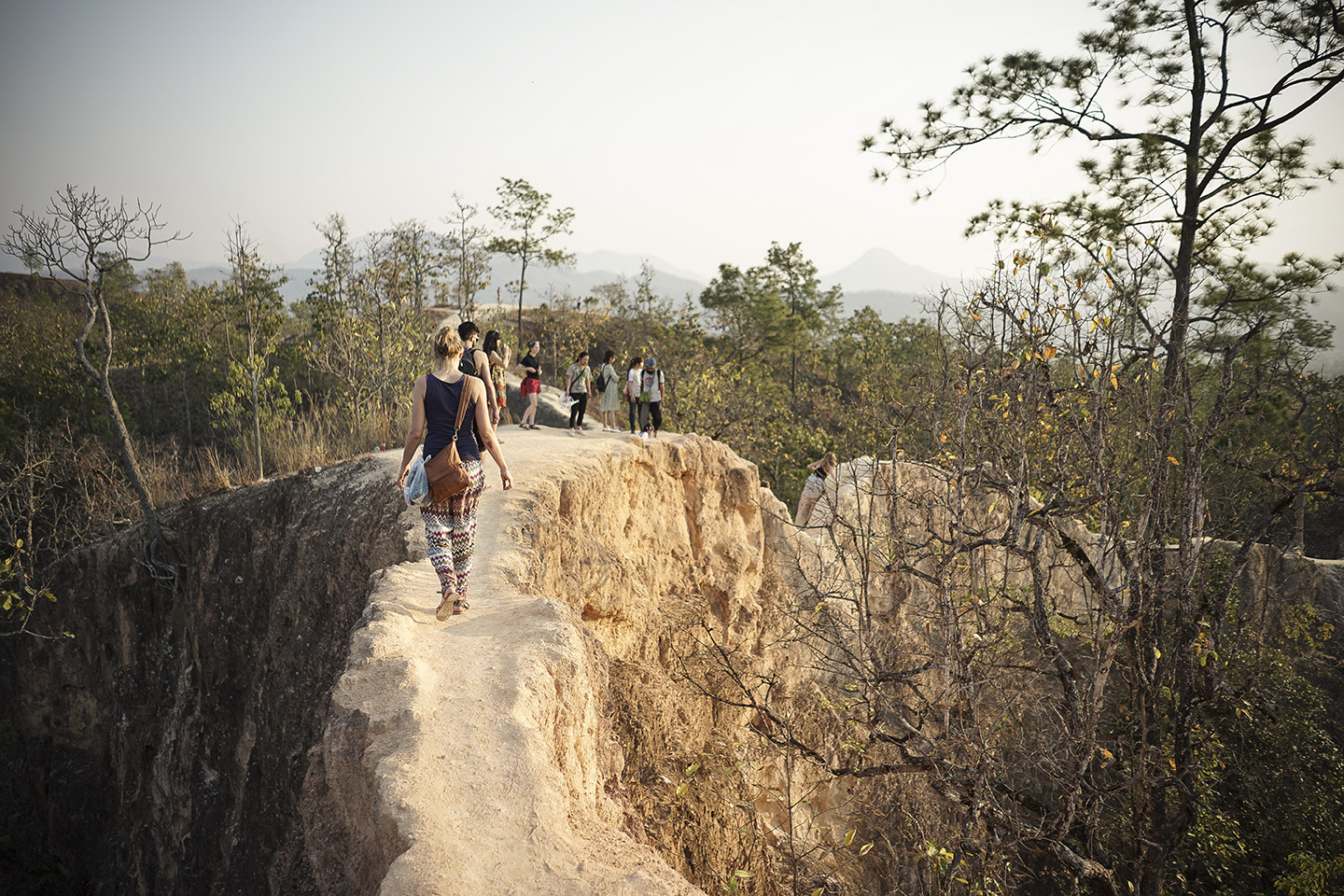 Anne and Soloman navigate the narrow ridge