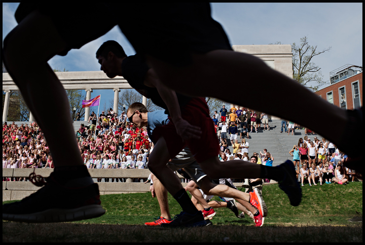 WKU fraternity members compete in the 40 yard dash during the Greek Week Events day at the Colonnade on WKU's campus on Thursday, April 10, 2014. This years events included the 40 yard dash, Ball Race, Sack Race, Egg Spoon Race, Egg Toss, Musical Ch