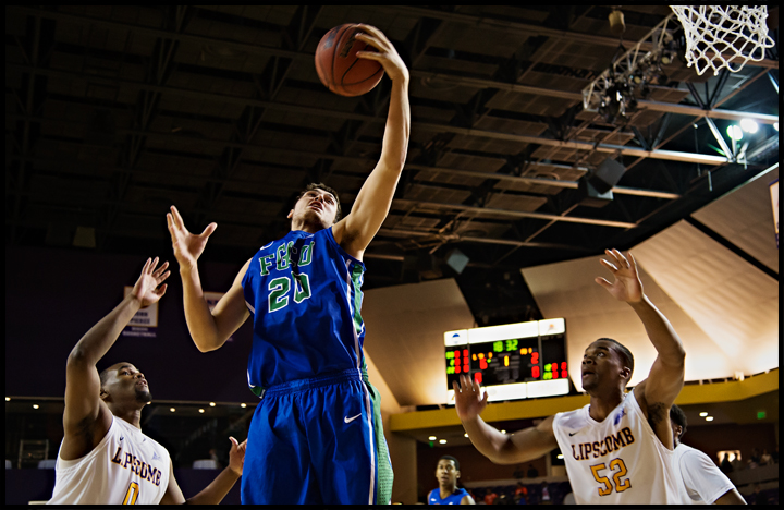 Florida Gulf Coast University's Chase Fieler grabs a rebound during their game against Lipscomb University at Lipscomb in Nashville, TN on Thursday, February 27, 2014. FGCU would go on to loose 93-71. Photos by Brian Powers