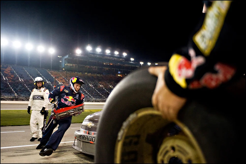 The pit crew works on changing all four wheels of Cole Whitt's Chevy during the NASCAR Camping World Truck Series at Chicagoland Speedway in Joliet, Ill on Friday, September 16, 2011. | Brian Powers~Sun-Times Media