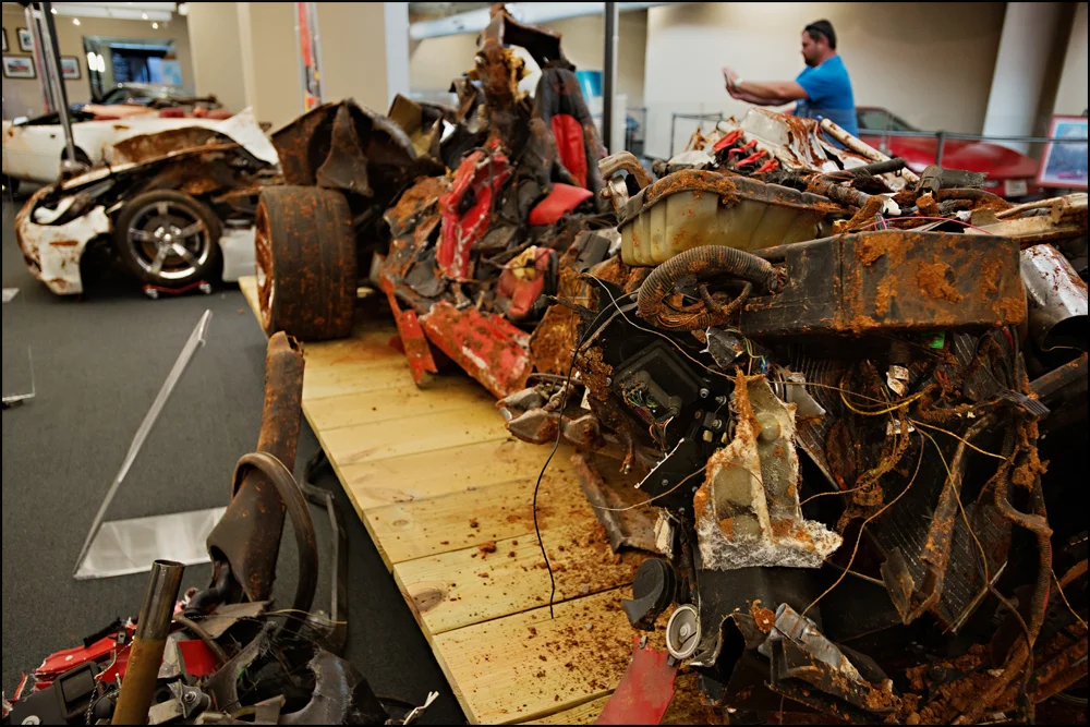 The 2001 Mallett Hammer Corvette that was on display in the Skydome at the National Corvette Museum sits on display in the condition that it was removed from the sinkhole in on Wednesday, June 25, 2014. Photo by Brian Powers