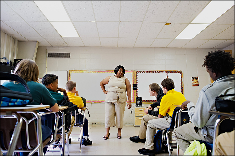  Special Education teacher Katrina Wiley talks to her students on the first day of classes at H.W. Byers High School in Holly Springs, Miss. on Monday, August 11, 2014. Wiley said she believes the new written portion of the Common Core tests will be 