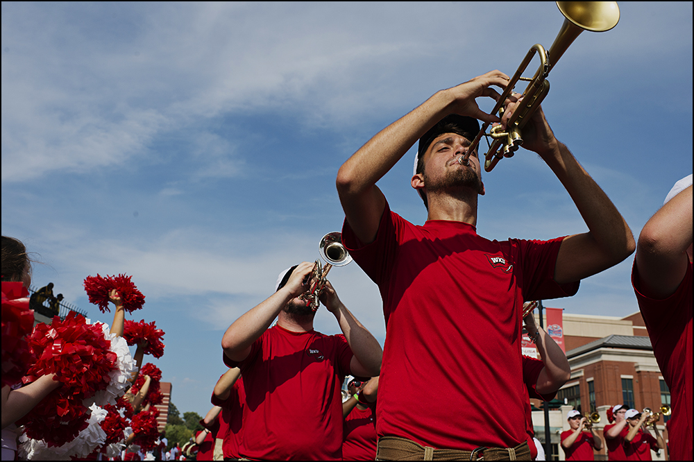  Aug 29, 2014; Bowling Green, KY, USA; The Western Kentucky Hilltoppers Marching Band parades down Avenue of Champions the the schools campus before their opening football game against the Bowling Green Falcons at Houchens Industries-L.T. Smith Stadi