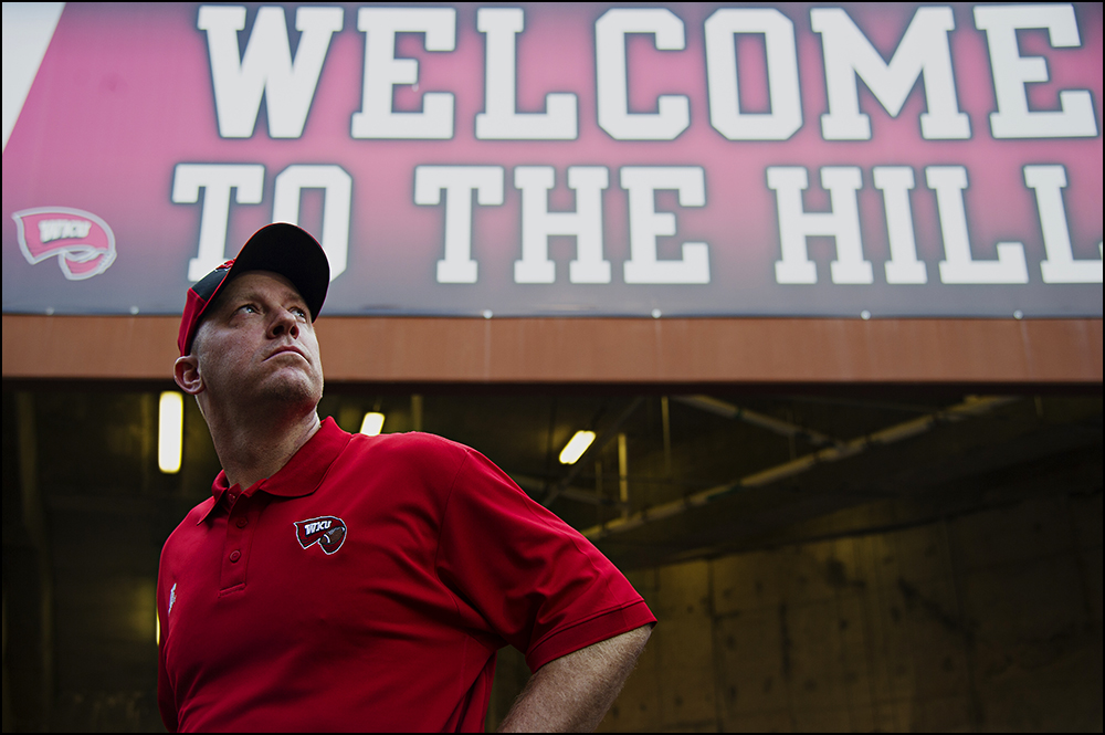  Aug 29, 2014; Bowling Green, KY, USA; Western Kentucky Hilltoppers head coach Jeff Brohm looks at the crowd before his team takes the field for their game against the Bowling Green Falcons at Houchens Industries-L.T. Smith Stadium. Mandatory Credit: