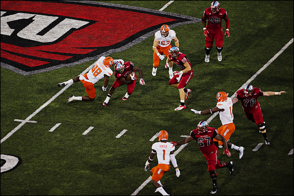  Aug 29, 2014; Bowling Green, KY, USA; Bowling Green Falcons defensive lineman Kendall Montgomery (88) grabs the face mask of Western Kentucky Hilltopper running back Leon Allen during their game at Houchens Industries-L.T. Smith Stadium. Mandatory C