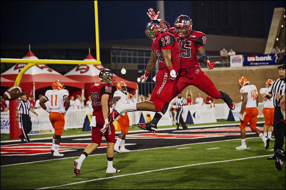  Aug 29, 2014; Bowling Green, KY, USA; Western Kentucky Hilltopper wide receivers Antwane Gant (13) and Nicholas Norris (15) celebrate a touchdown to take the lead 20-0 in the second quarter over the Bowling Green Falcons at Houchens Industries-L.T. 